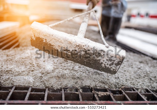 Concrete Pouring Tool During Commercial Concreting Stock Photo (Edit
