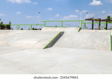 concrete ramps for skating in a skate park - Powered by Shutterstock