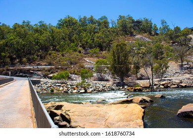 Concrete Road Over The Rocks To View The Massive Concrete Wall And Slipway  Of Wellington Dam Near Collie Western Australia On A Fine Morning In Summer Is One Way Traffic Only.