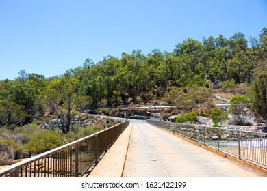 Concrete Road Over The Rocks To View The Massive Concrete Wall And Slipway  Of Wellington Dam Near Collie Western Australia On A Fine Morning In Summer Is One Way Traffic Only.