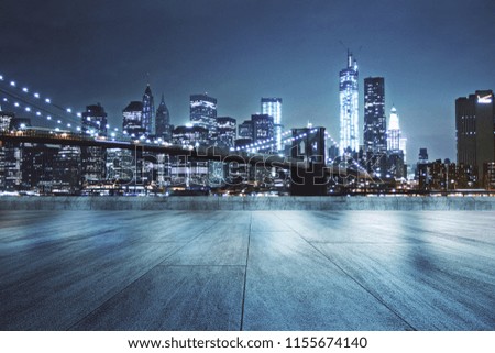 Concrete rooftop with beautiful night city view background 