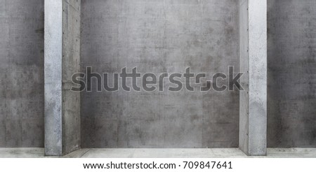 Concrete room with columns or pillars, in wide header image format.