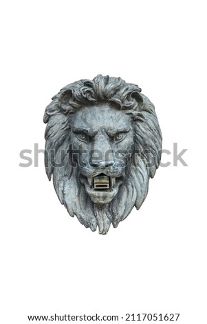 concrete sculpture of the head of a formidable lion isolated on a white background
