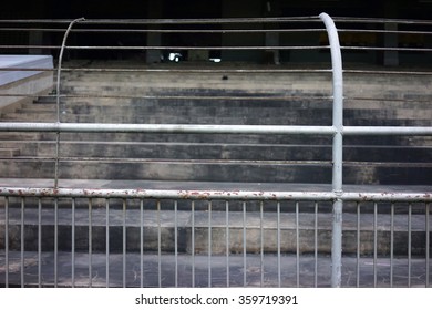 Concrete Seating Stand At Horse Racing Track And Fence.