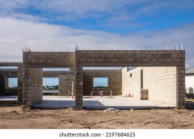 Concrete Shell Of Single-family House Under Construction In A Suburban Development On A Sunny Morning In Southwest Florida