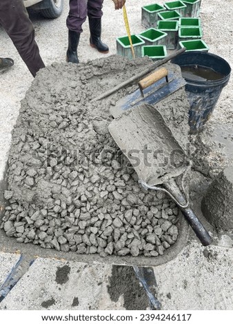 A concrete slump test was done at the site. The concrete slump test is a measurement of concrete's workability, or fluidity. It's an indirect measurement of concrete consistency or stiffness.