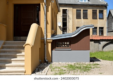 concrete stairs lead up to the historic building - Powered by Shutterstock