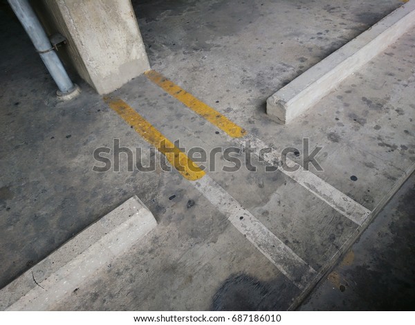 Concrete sticks\
for car stops, car park\
markers
