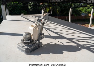 Concrete Surface Sanding Machine At Construction Site. Concrete Floors. Epoxy Concrete.