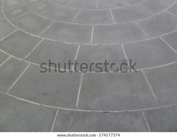Concrete tile on road\
surface