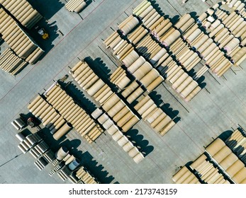 Concrete Tubes. Industrial Storage Place Of Round Concrete Elements. Aerial View Of Industrial Place.