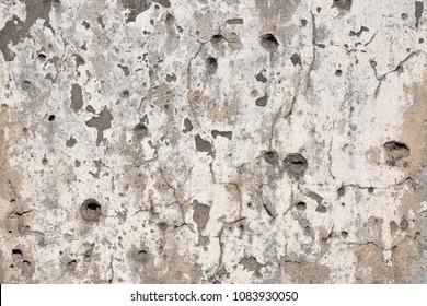 Concrete Wall Background With Bullet Holes, Potholes From Weapon Shooting