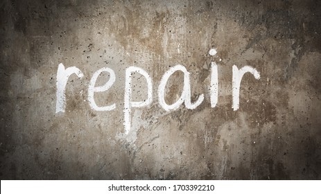 Concrete Wall Background With Text Repair. On The Wall In White Paint Is Written Repair.