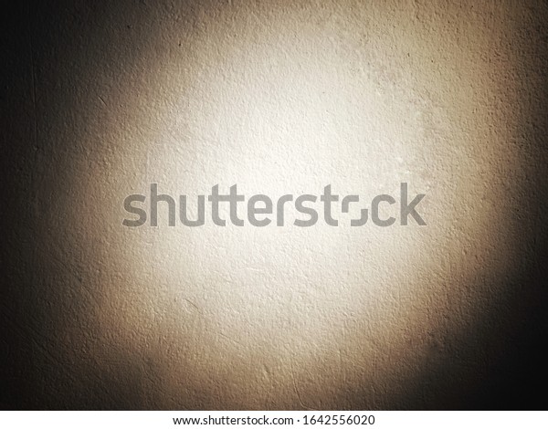 concrete wall\
background texture or rough plaster wall abstract art pattern\
painted with vintage dirt white tone color in black frame shadow\
for creative work with copy\
space