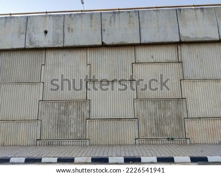 Concrete Wall and Cement Floor for Copy Space. concrete bridge wall making a bridge. multiple name called, reinforced wall, soil wall, blocks or indian new road  blocks 
