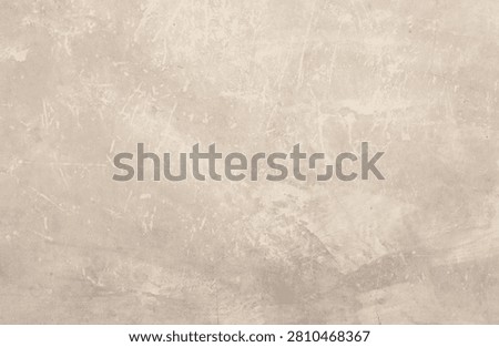 ​Beige concrete wall texture background with subtle scratches and grunge details