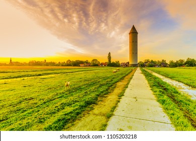 Concrete, Water Tower In The Meije As Example Of First Use Sliding Formwork Is In A Magnificent Polder And Lake Landscape In The Dutch Province Of South Holland During Early Sunrise With Overwhelming 