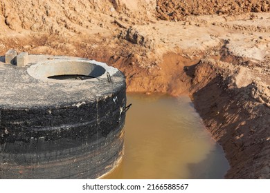 Concrete Well Sewerage, Emergency Well Repair, Septic Tank For Dirty Water, Installation Of Concrete Rings. Sewer Well In The Water