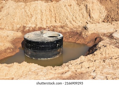 Concrete Well Sewerage, Emergency Well Repair, Septic Tank For Dirty Water, Installation Of Concrete Rings. Sewer Well In The Water