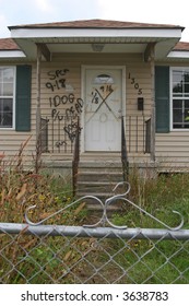 A Condemned Home In The 9th Ward Of New Orleans, Louisiana, Damaged In Hurricane Katrina. The Writing Indicates A Dead Dog Was Found In The Home And Needed To Be Picked Up.