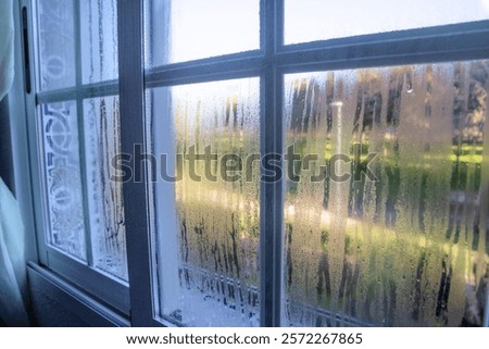 Condensation on the bedroom window. Problems with humidity, mould, fungus, ventilation, cold and heat.