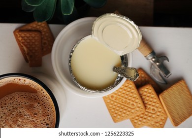 Condensed Milk With Cookies And Coffee