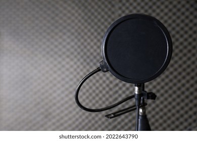 Condenser Mic On A Mic Stand In Studio