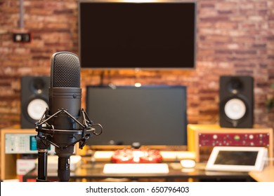 Condenser Microphone On Digital Recording Studio Background