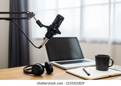 Condenser Microphone In Recording Home Studio. Content Creator Working With Laptop Host Streaming Radio Podcast Interview Conversation At Home Broadcast Studio Recording Voice Over Radio