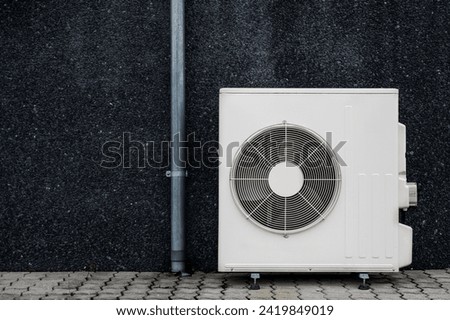 Condensing unit on exterior building facade, Denmark