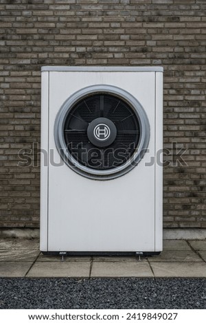 Condensing unit on exterior building facade, Denmark
