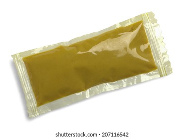 Condiment Mustard Packet Isolated On A White Background.