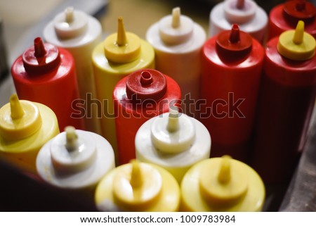 condiments-mustard-mayonnaise-ketchup-hot-450w-1009783984.jpg
