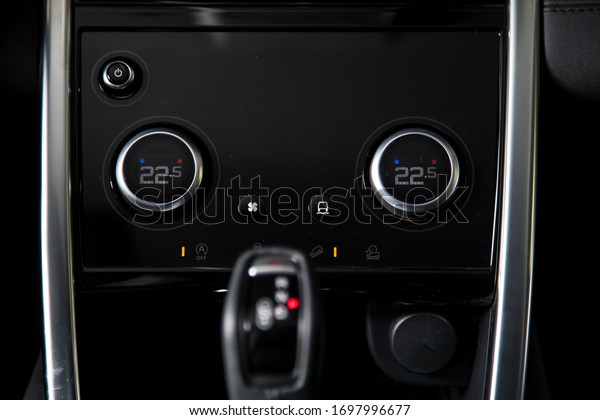 Conditioner\
climate control in a modern car.\
Buttons\\