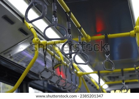 Conditions on the Trans Jakarta bus. a place to rest on the bus. Trans Jakarta bus passenger seat. bus passenger handrails.