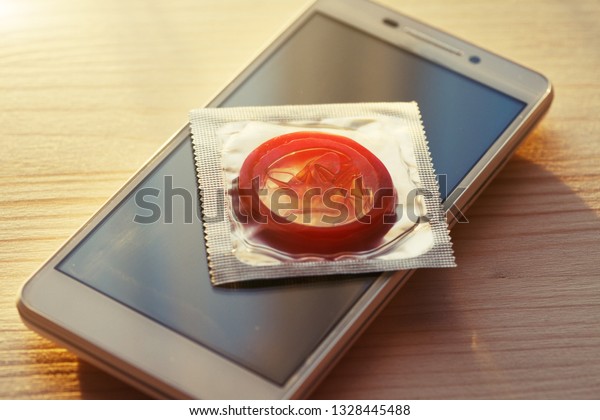 Condom Pack On Smartphone Screen Virtual Stock Photo Edit Now 13284454