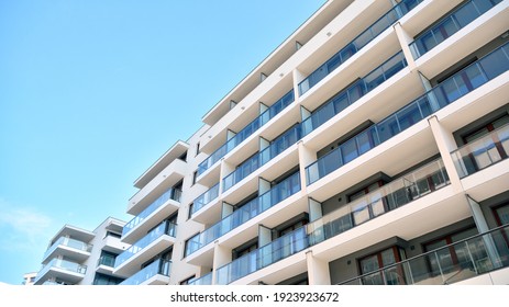 Condominium and apartment building with  symmetrical modern architecture in the city downtown. - Shutterstock ID 1923923672