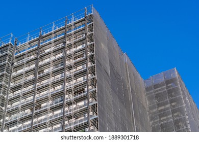 A condominium with scaffolding during large-scale repair work