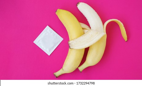 Condoms and two bananas, concept of contraceptives and the prevention of venereal diseases of same-sex marriage. The concept of a friendly couple.