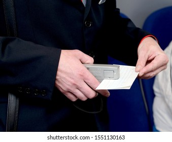 Conductor Checking Tickets In Train