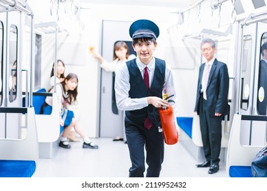 Conductor Extinguishing A Fire In A Train Car