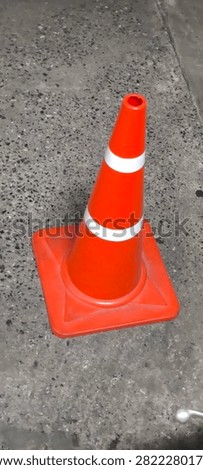 The cone is designed for durability. with materials that allow it to withstand impacts or being run over by vehicles without cracking.
