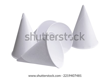 Cone shape disposable paper cups on white background