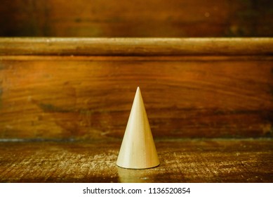 Cone shapes of solid wood to study geometry