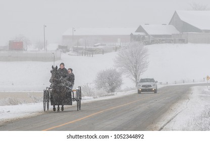 Conestogo, Ontario/ Canada - December 23, 2017:Amish With Horse And Buggy In Rural Ontario In Winter 