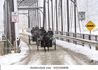 Conestogo, Ontario/ Canada - December 23, 2017:Amish With Horse And Buggy In Rural Ontario In Winter 