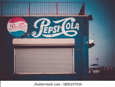 Coney Island, Brooklyn, NY, USA - August 21, 2020.
The Big Sign Of Pepsi-Cola Brand. Illustration  Painted On The Wall. Vintage Look Photo.