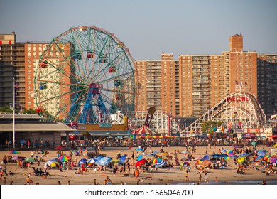 Coney Island, New York, August, 2018: an amusement park and the beach of Coney Island in summer