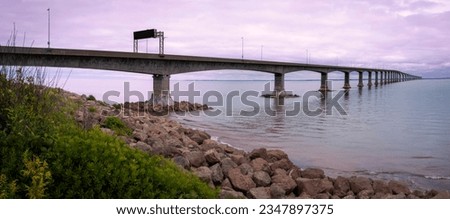 Confederation Bridge, World's largest bridge over Northumberland Strait connecting Prince Edward Island to New Brunswick in Borden-Carleton, PE, Canada, during foggy stormy weather conditions