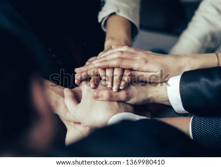 The conference of entrepreneurs. The folding of hands together